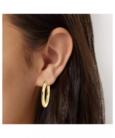 Canaria Italian 10kt Yellow Gold Textured and Polished Oval Hoop Earrings $79.20 Earrings